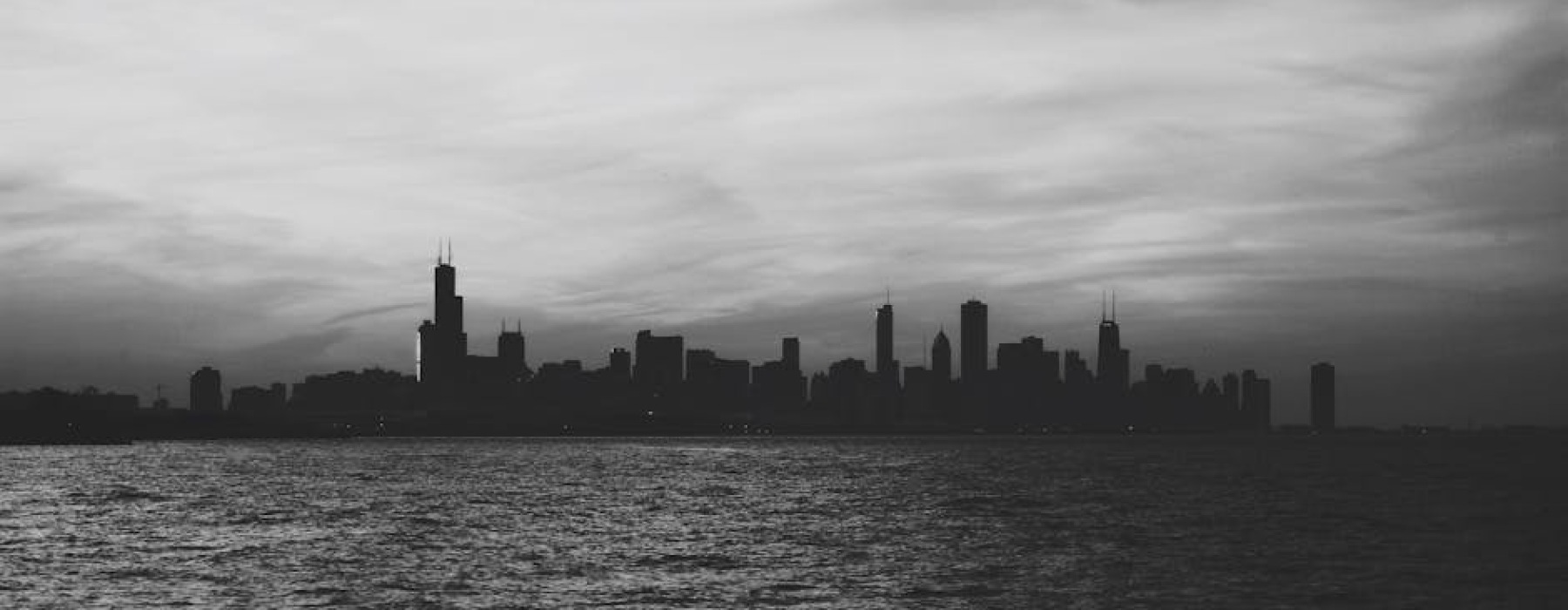 Chicago skyline with dog silhouettes - chicago pet amenities