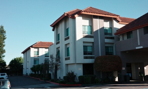 Stride West Apartments exterior Spanish architecture Westside Albuquerque